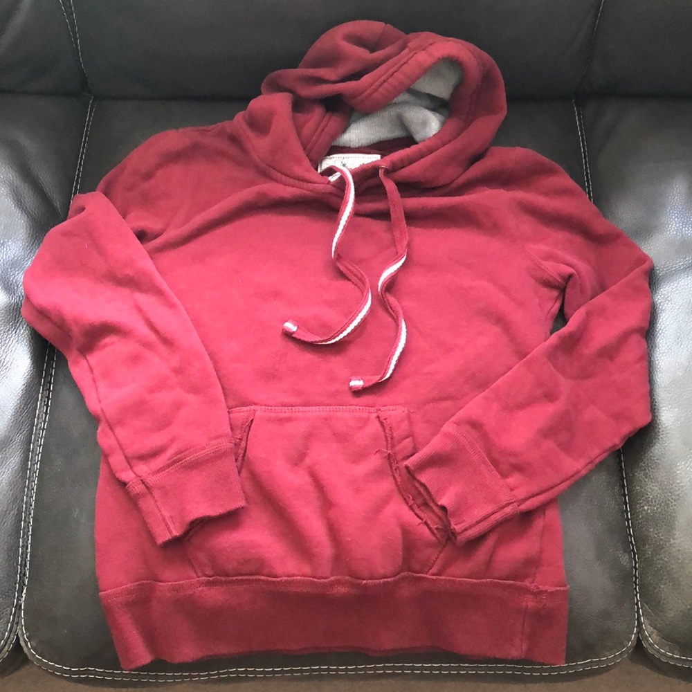 Maroon red sweatshirt.